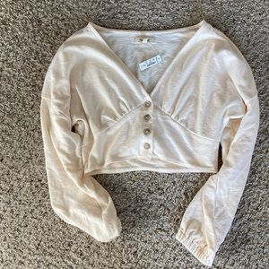 NWT Madewell Cream colored cropped cardigan style top. Size small